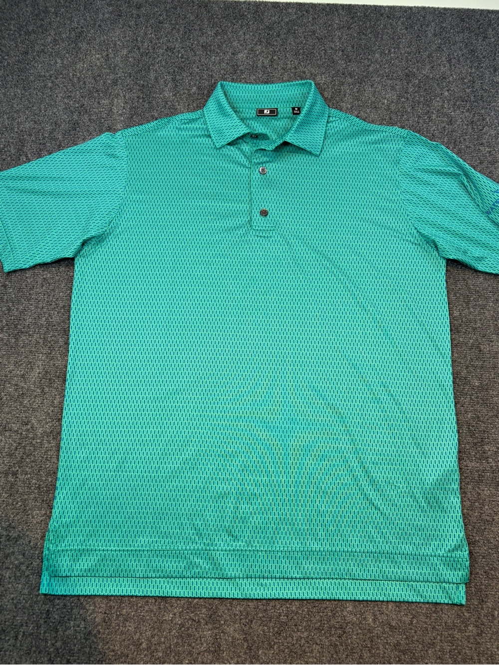 FootJoy green geometric performance golf polo size M.